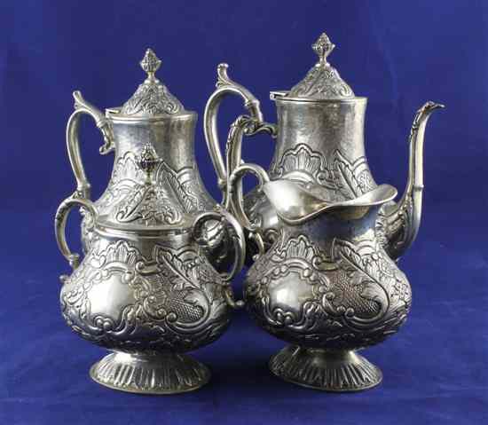 Appraisal: An Indian white metal four piece pedestal tea and coffee