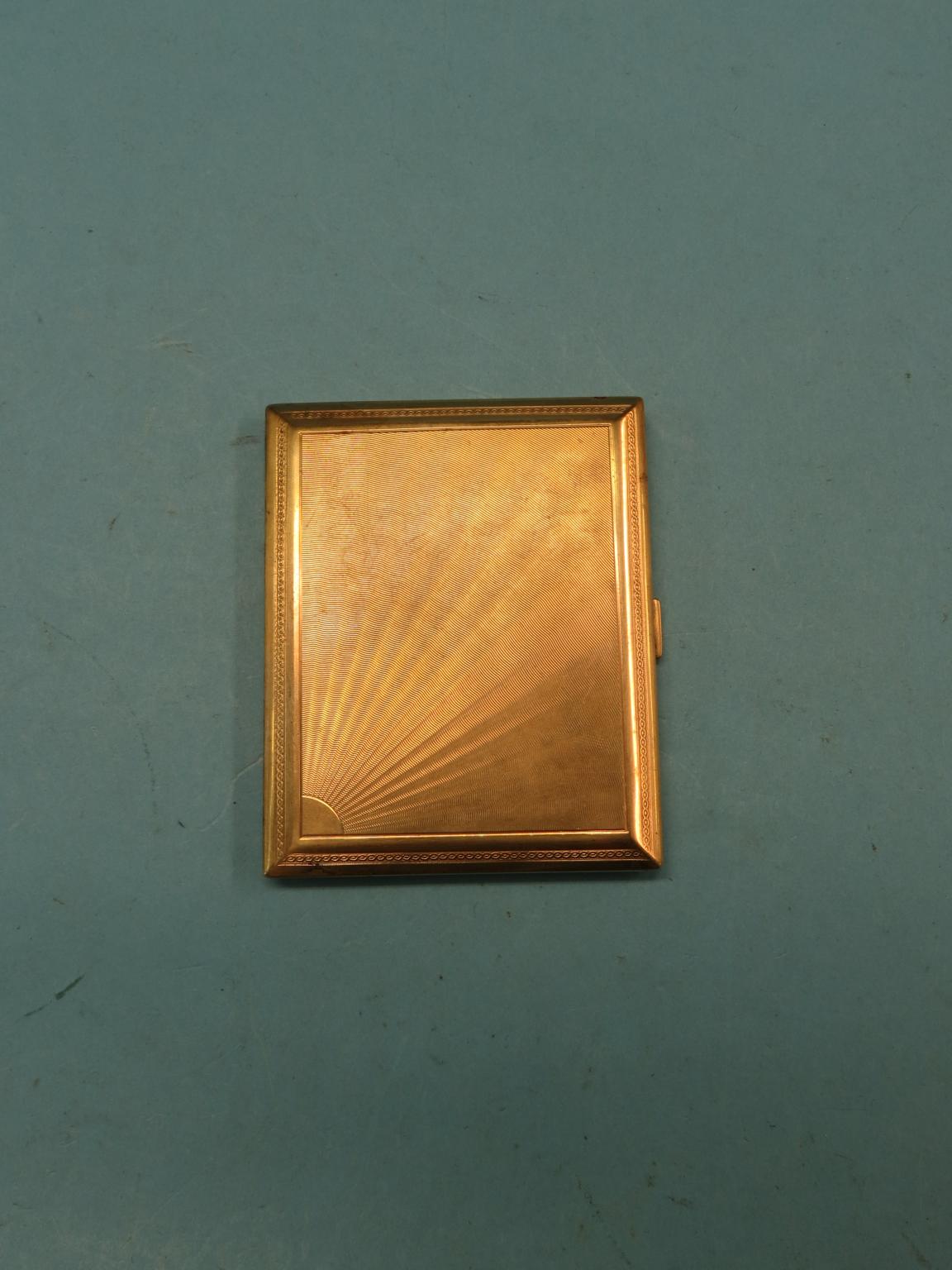 Appraisal: An engine-turned ct gold cigarette case sunburst-design London grams SEE