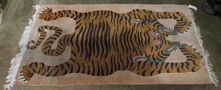 Appraisal: Beige rug depicting a splayed tiger at rest ' x