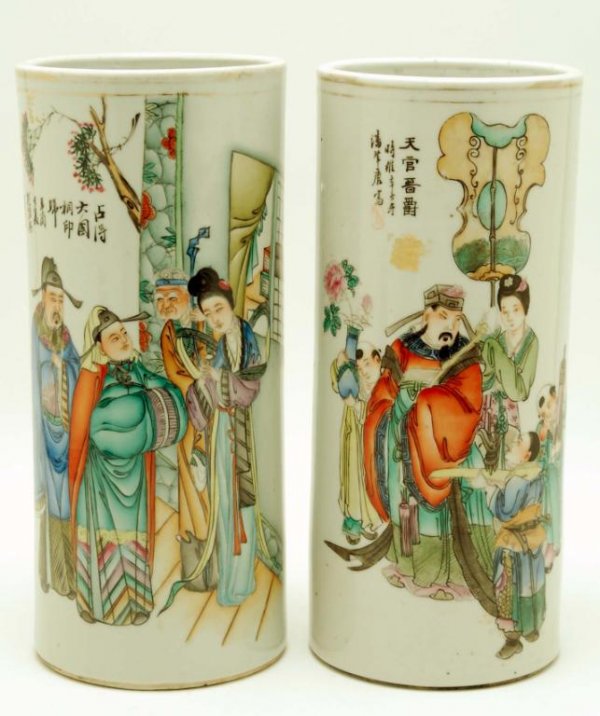 Appraisal: A pair of Chinese cylinder vases decorated with hand painted