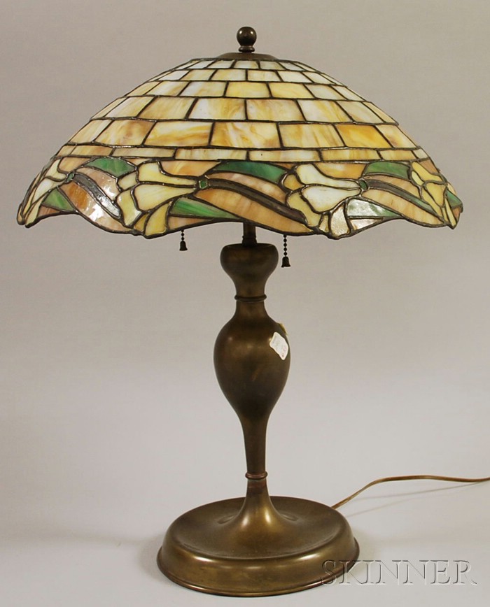 Appraisal: Leaded Slag Glass Brickwork and Floral Pattern Table Lamp Shade