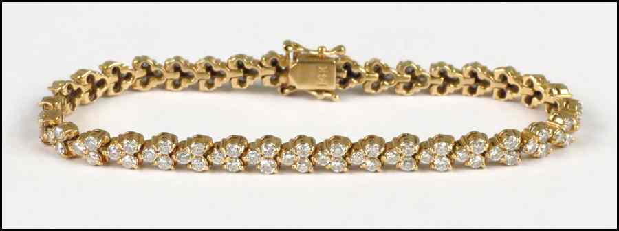 Appraisal: DIAMOND AND KARAT YELLOW GOLD BRACELET Comprised of round brilliant