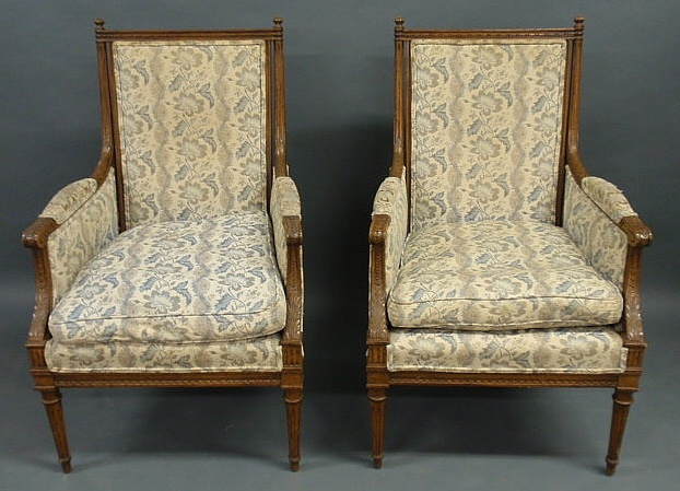 Appraisal: Pair of French fruitwood armchairs h x w x d