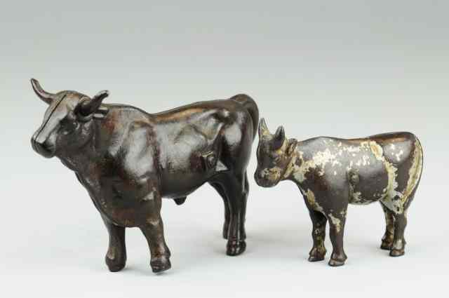 Appraisal: LOT OF TWO STEER STILL BANKS Cast iron each in