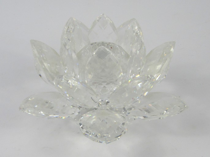 Appraisal: A Swarovski crystal candle holder modelled as a Water Lily