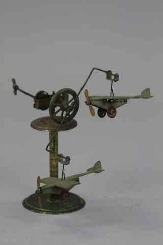 Appraisal: AIRPLANE MECHANICAL TOY Fischer Germany very unusual simulated flight toy