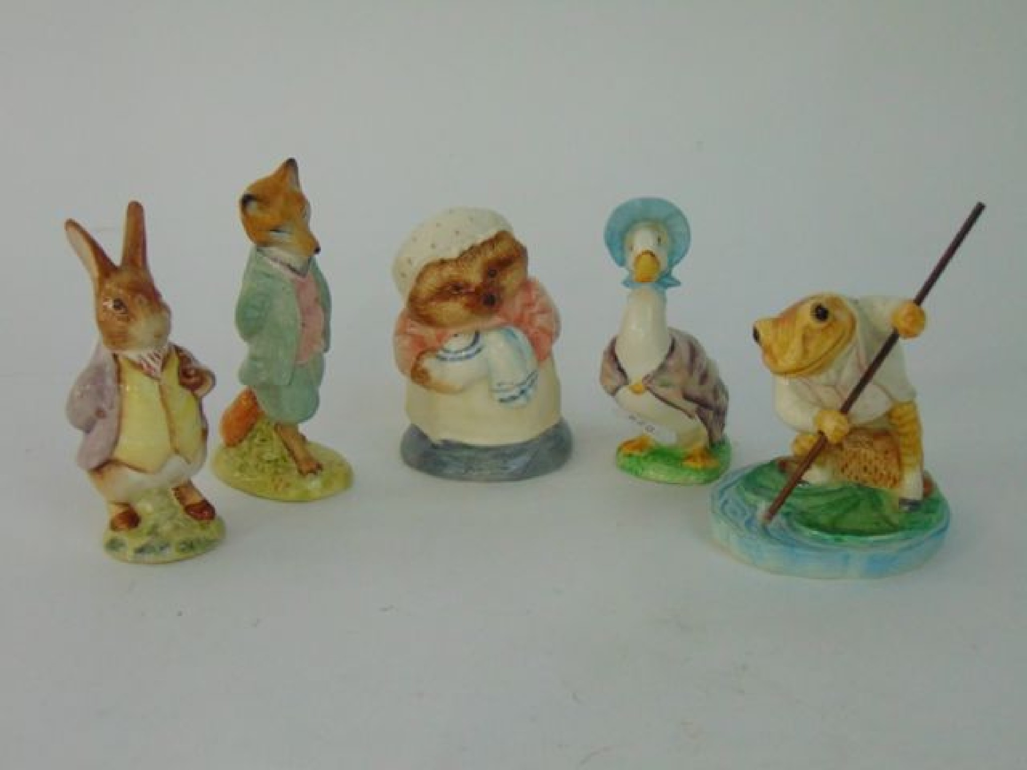 Appraisal: A collection of five Beatrix Potter figures - three Beswick