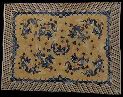 Appraisal: CHINESE DRAGON CARPET The tan field worked with blue dragons