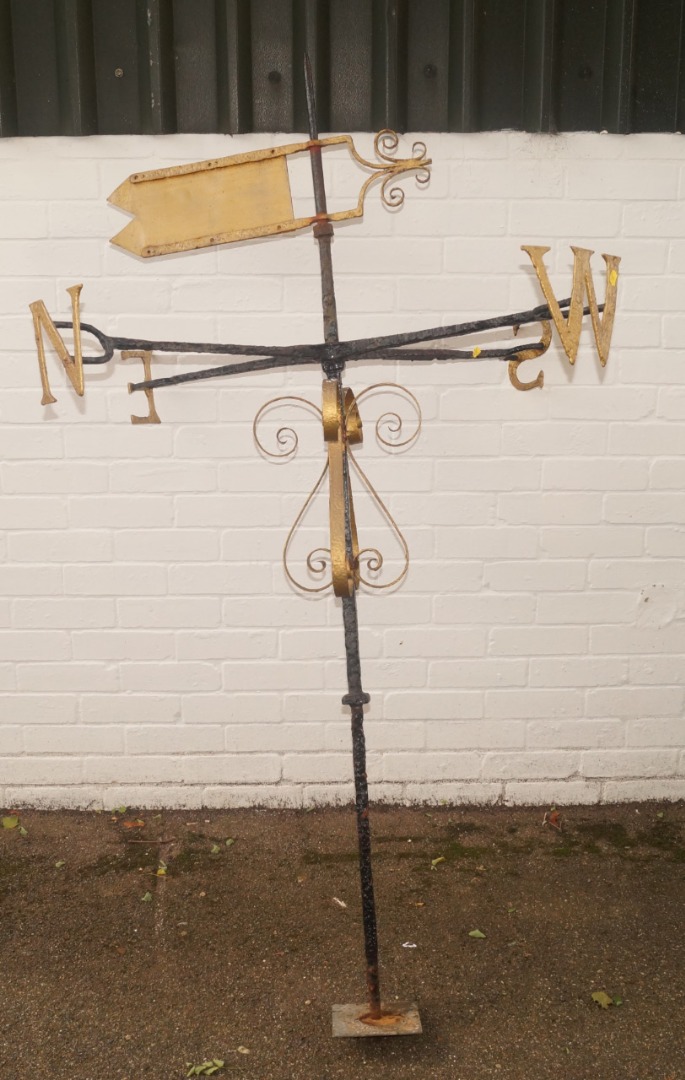 Appraisal: A cast iron Folk Art weather vane with articulated cross