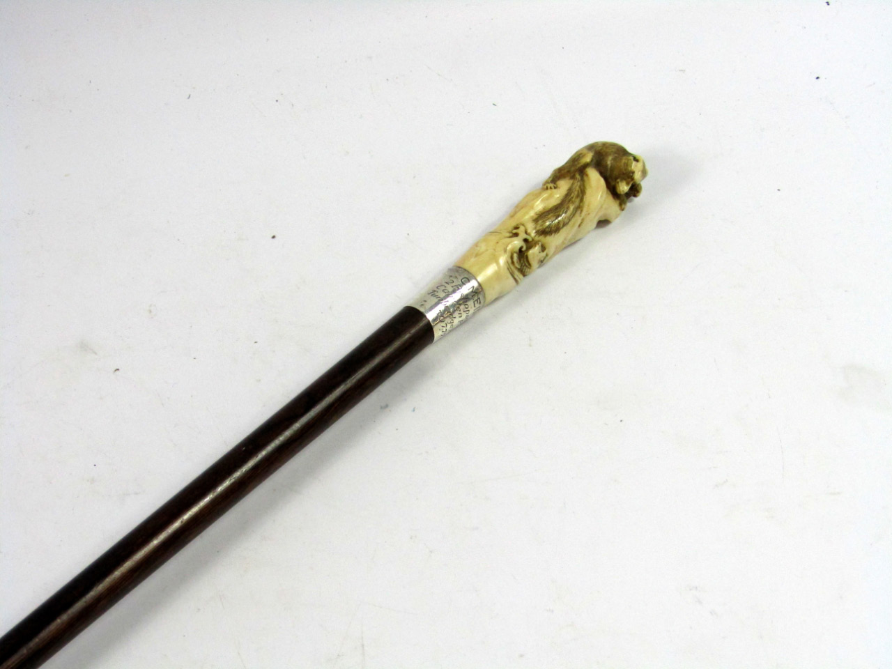 Appraisal: A walking cane early thC with a Japanese ivory handle