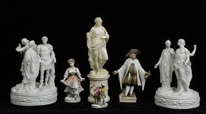 Appraisal: PAIR OF CONTINENTAL IVORY-GLAZED PORCELAIN GROUPS AND FOUR PORCELAIN FIGURES