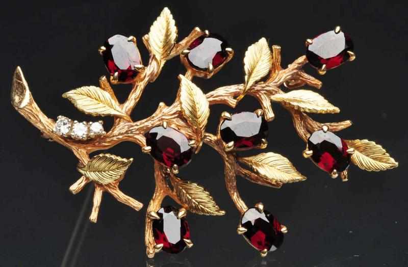 Appraisal: K Y Gold Garnet Diamond Pin Weight grams Condition Excellent