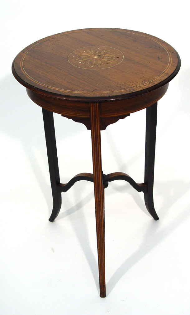 Appraisal: Victorian circular rosewood side table with strung floral design inlay