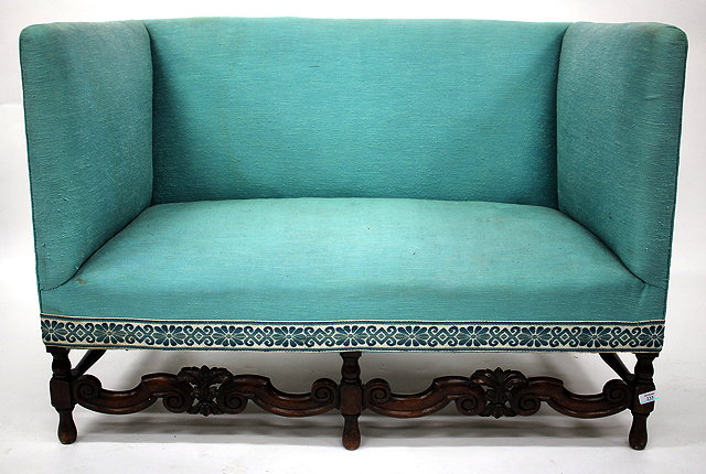 Appraisal: A QUEEN ANNE STYLE SOFA upholstered in blue material the