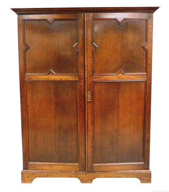 Appraisal: Jacobean style two-door armoire with fitted interior c oak recessed