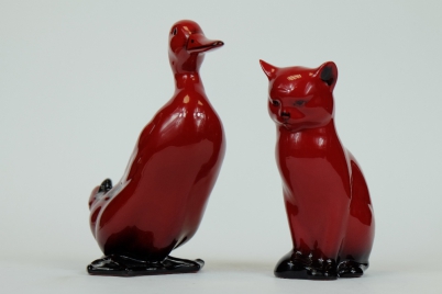 Appraisal: Royal Doulton flambe model of seated cat and Drake tallest