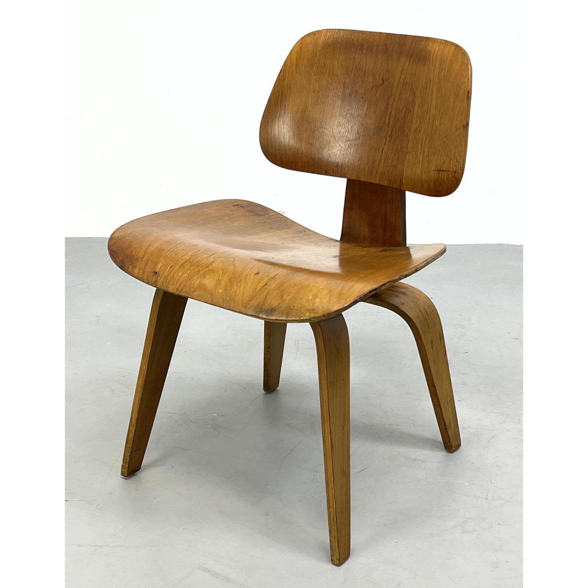 Appraisal: Charles and Ray Eames for Herman Miller Evans Products Walnut