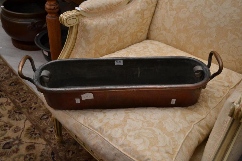 Appraisal: A COPPER TWO HANDLED TROUGH WITH INSET A COPPER THE