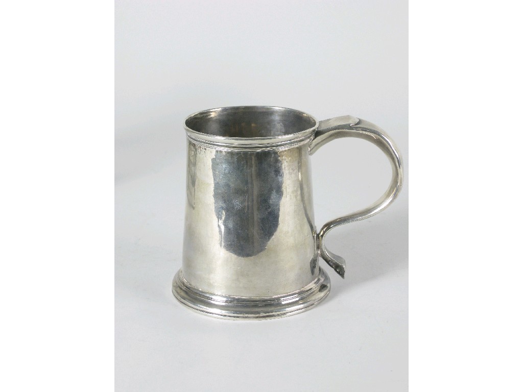 Appraisal: An early Georgian straight sided Pint Mug with scroll handle