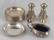 Appraisal: A pair of white metal pepper and salt marked and