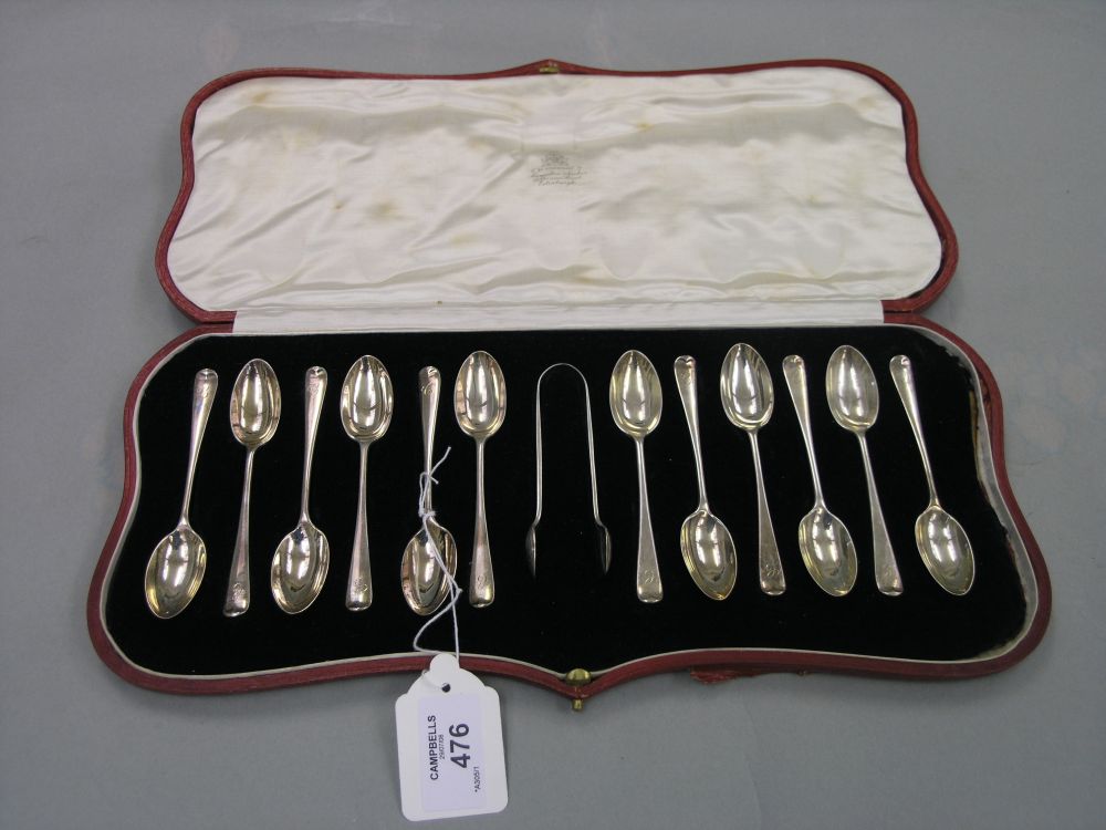 Appraisal: A set of twelve silver coffee spoons complete with matching