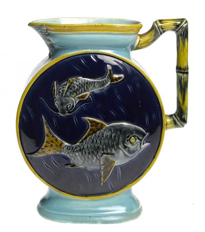 Appraisal: A JOSEPH HOLDCROFT MAJOLICA AESTHETIC JUG in the form of