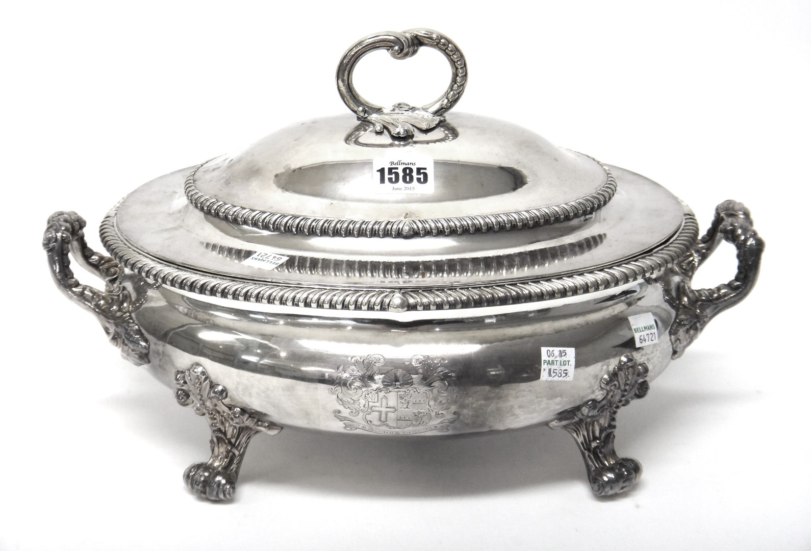 Appraisal: A Sheffield Plated twin handled oval soup tureen with a