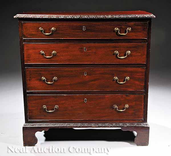 Appraisal: An Antique George III-Style Carved Mahogany Bachelor's Chest rectangular top