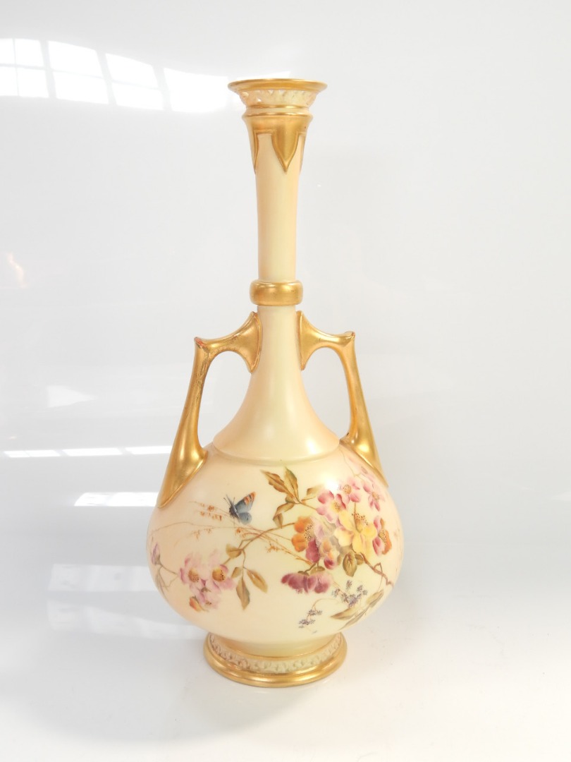 Appraisal: A Royal Worcester blush ivory baluster vase with gilt mounts