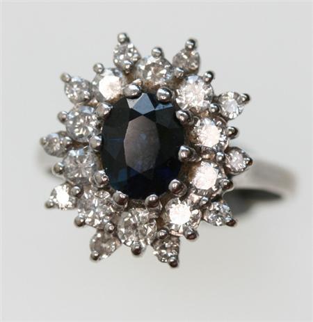 Appraisal: A sapphire and diamond ring the oval sapphire with a