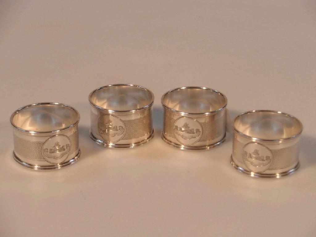 Appraisal: A set of four George V silver napkin rings Birmingham