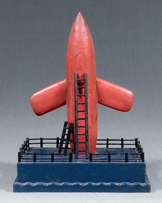 Appraisal: Folk art rocket carved and painted rocket with mounting ladder