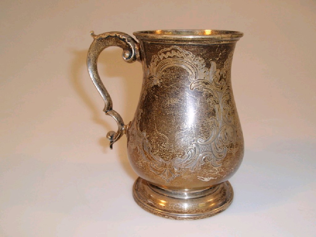 Appraisal: An early Victorian silver baluster jug with acanthus scroll handle