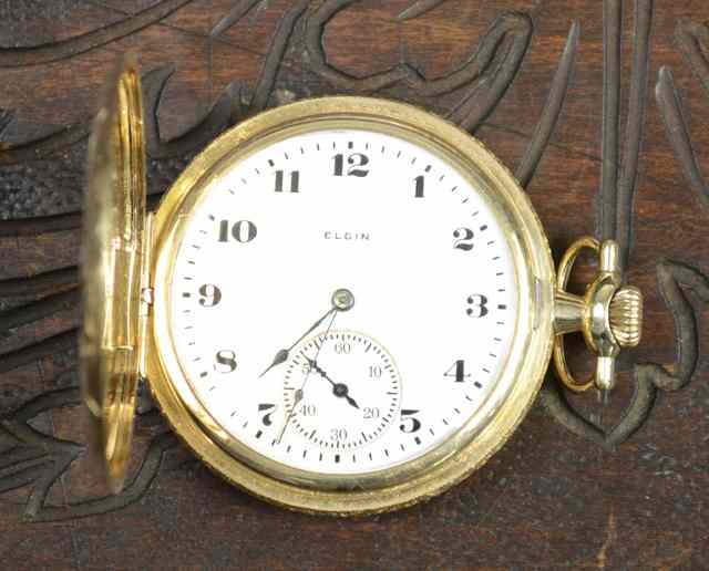 Appraisal: AN AMERICAN FOURTEEN KARAT GOLD HUNTER CASE POCKET WATCH Elgin