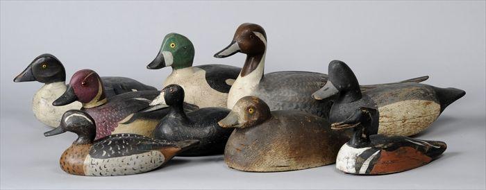 Appraisal: NINE PAINTED WOOD DECOYS All with variously colored plumage to