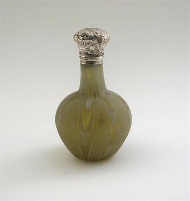 Appraisal: A Victorian mounted baluster glass scent with a pale yellow