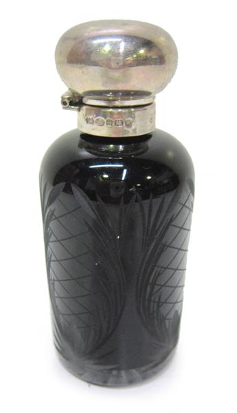 Appraisal: A RUBY WHEEL-CUT BOTTLE WITH STERLING SILVER LID AND COLLAR