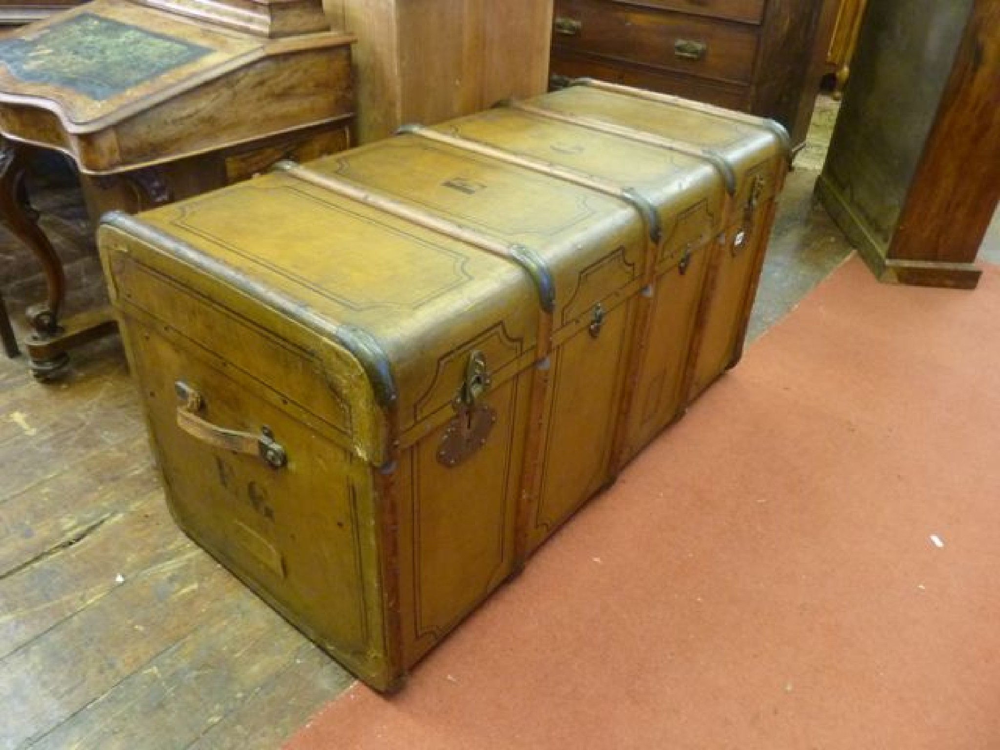 Appraisal: A substantial th century travelling trunk with a tan coloured