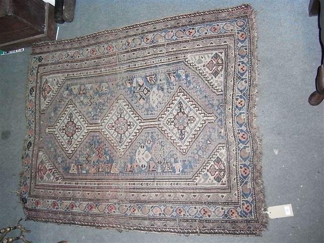 Appraisal: A SIMILAR BLUE GROUND RUG X approx