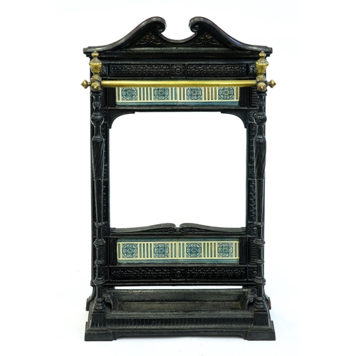 Appraisal: A Victorian tiled cast iron stick stand with brass rails