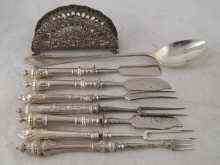 Appraisal: A mixed lot comprising a continental standard silver serviette holder