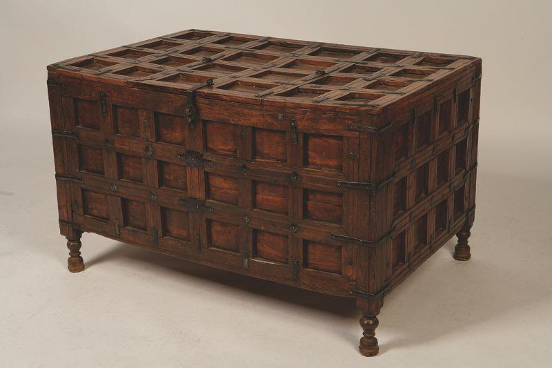 Appraisal: A COLONIAL HARDWOOD AND METAL BOUND CHEST of framed construction