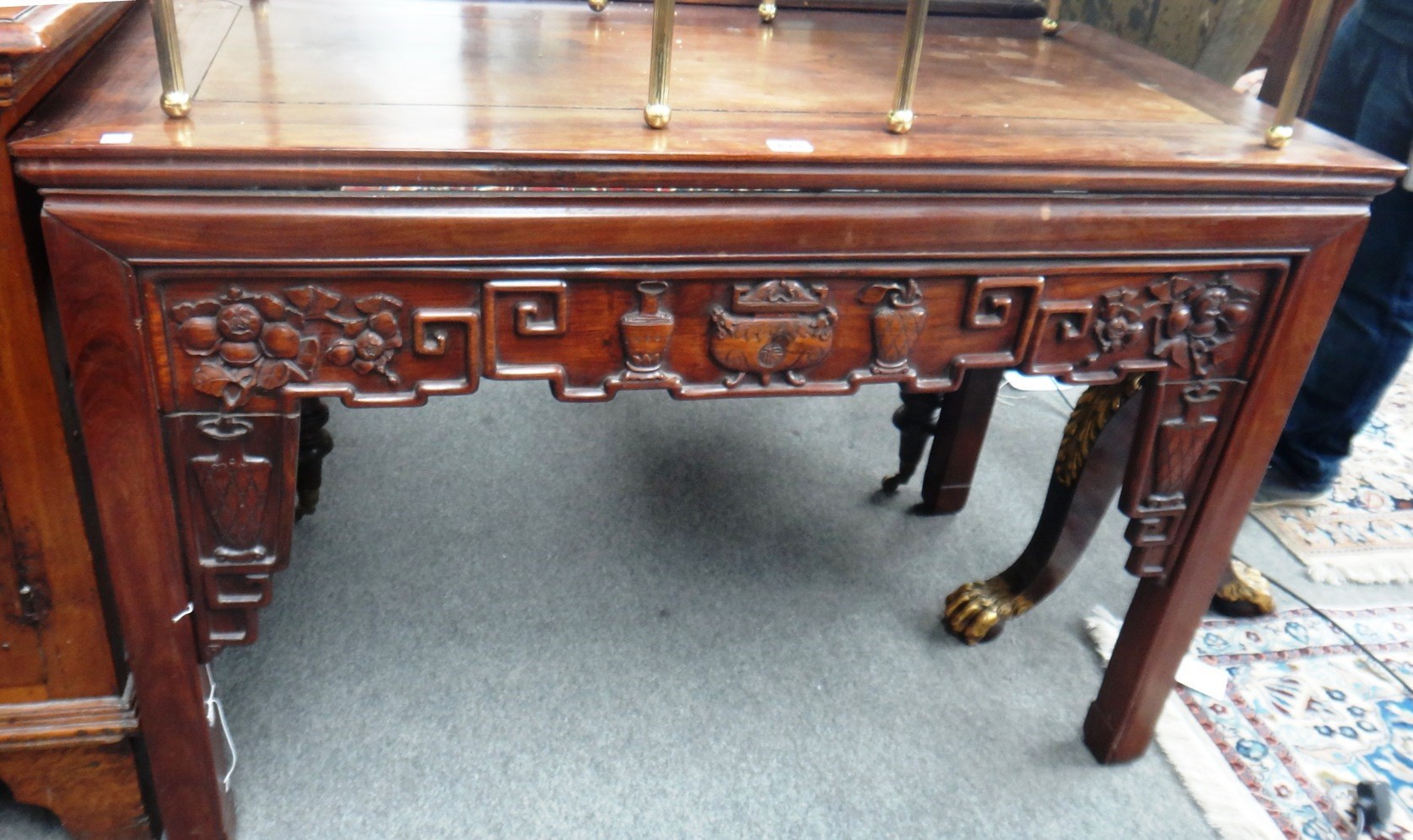 Appraisal: A late th century Chinese hongmu altar table with carved