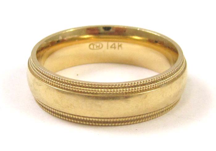 Appraisal: MAN'S FOURTEEN KARAT GOLD RING weighing grams and measuring mm