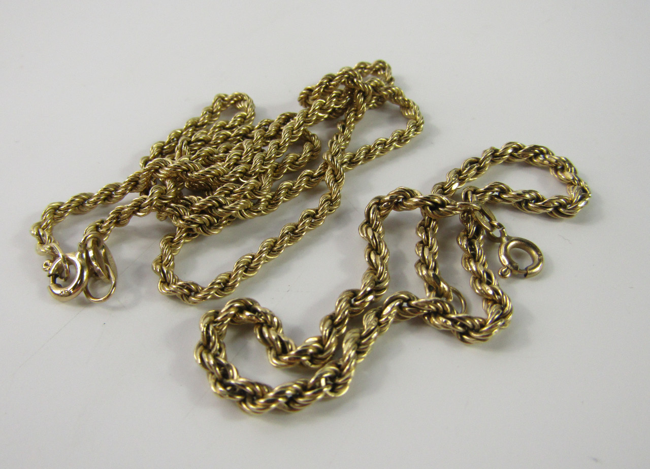 Appraisal: A ct gold rope twist neck chain and matching bracelet