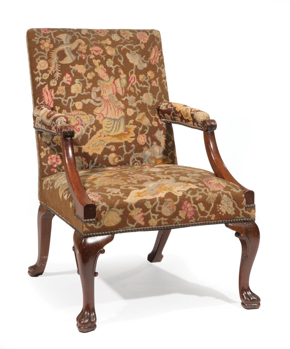 Appraisal: Antique Georgian-Style Mahogany Library Armchair needlepoint upholstery scrolled arms cabriole