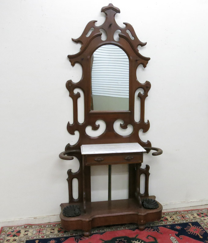 Appraisal: A VICTORIAN WALNUT HALLSTAND Rococo Revival design American last quarter