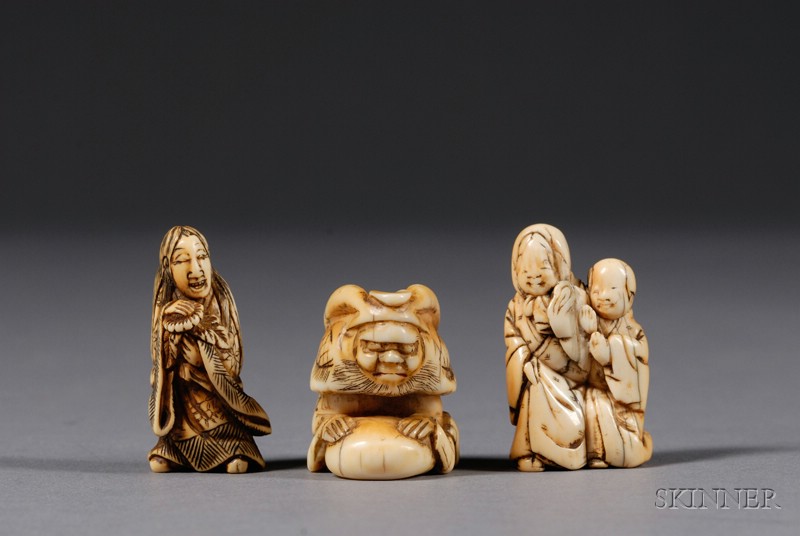 Appraisal: Three Ivory Netsuke th century a woman and child a