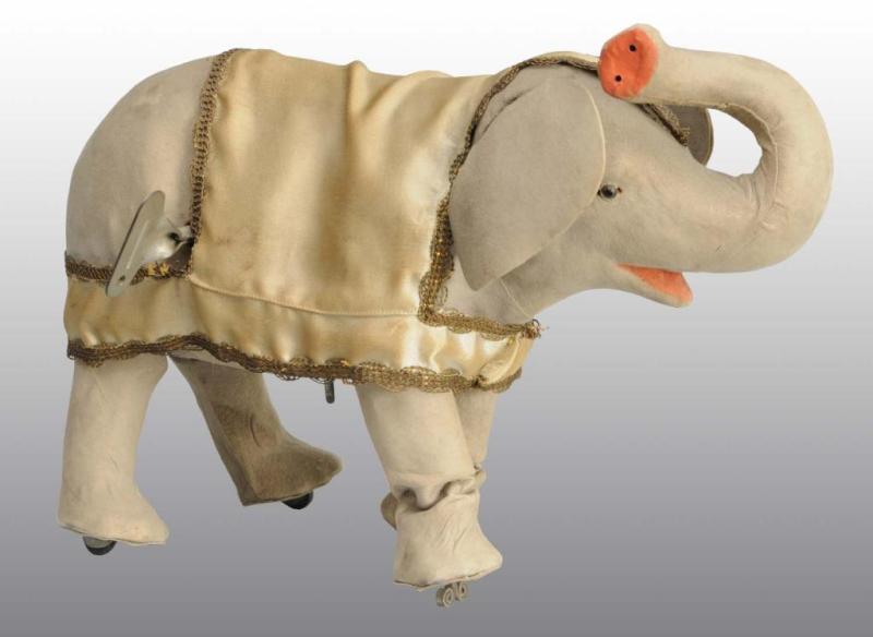 Appraisal: Decamps Elephant Clockwork Toy Description French Working Hide is covered