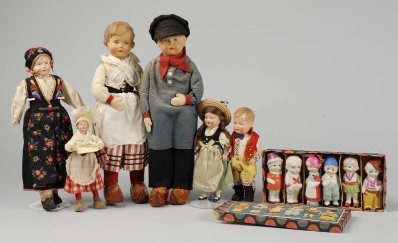 Appraisal: Lot of Celluloid and Bisque Dolls Description French pair with